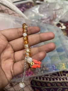 orange Beaded Bracelet with Charm