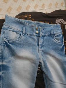 Light Wash Jeans with Button Detail