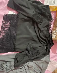 Asymmetrical black lace top