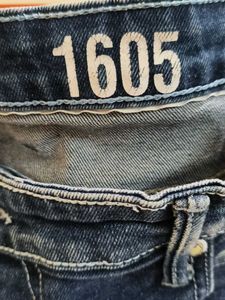 Distressed Dark Wash Denim Jeans