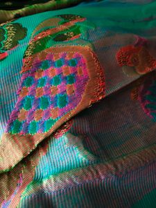 Dark green paithani saree