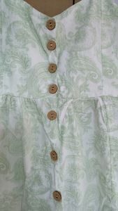 White and green printed dress