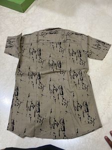 Revlon XL Size Shirt