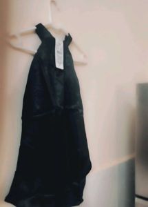 She in Elegant Black Halter Top