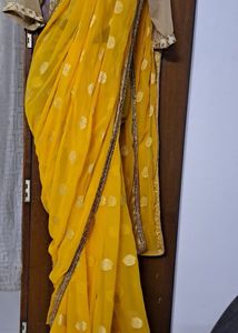 Yellow Border Saree With Golden Blouse