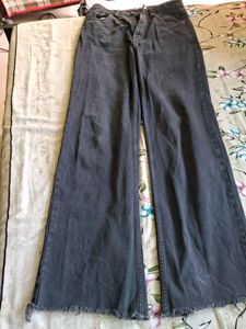 A Mixture Of Greyish Balckish Jeans