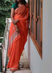 Orange Saree With White Stone Work