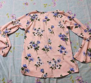 Cute pink bell-sleeve top!