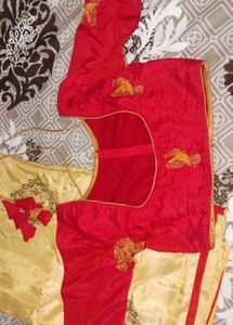 Elegant Gold Saree with Red Blouse
