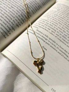 Bow Infinity Pendant Necklace (Anti Tarnish)