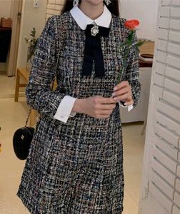 Chic Tweed Dress with Bow Detail