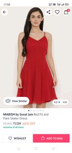 Dress (Designer) with back detailing.   MABISH By