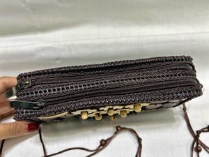 Brown Hand Clutch With Wooden Beads