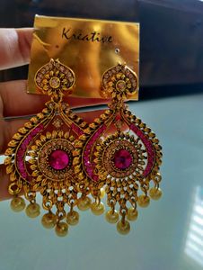 Statement earrings with pink stone and pearl