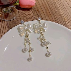 Sheron bow dangling earing