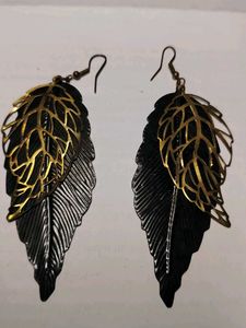 black and golden earrings