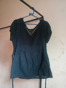 black baby doll top