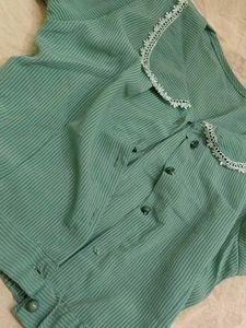 A beautiful sea green coloured crop shirt..