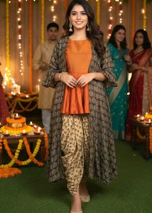 modern pulm top and dhoti along with shrug