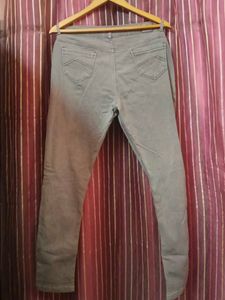 Grey Jeans with Red Stripe