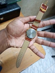 Sonata Gold Watch