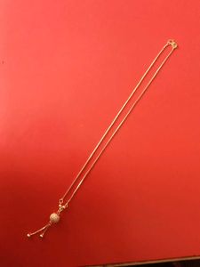 Gold Tone Ball Pendant Necklace