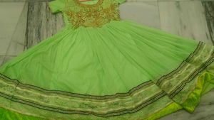 Elegant Green Embroidered Dress with Gold Detailin