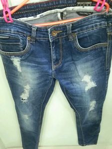 Distressed Denim Jeans