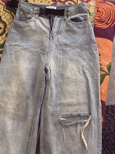 Ripped Light Wash Denim Jeans