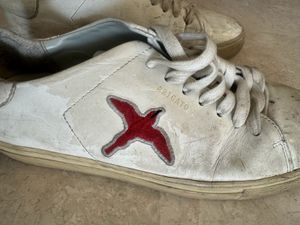 Worn White Sneakers