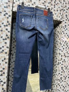 Distressed Denim Jeans