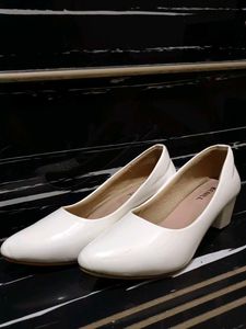 White Kitten Heels