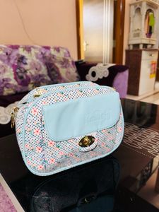 Sky Blue Sling Bags.
