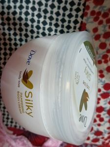 dove body love silky pampering body cream. unused. and new