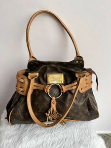 Louis Vuitton Logo Handbag with tassel