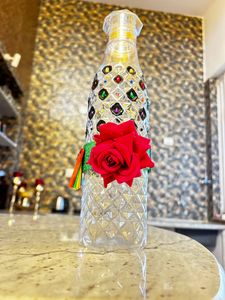 Crystallized designer plastic bottle