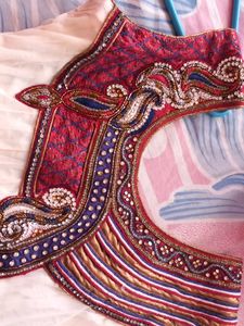 Off white net anarkali with beautiful neckline and beads embroidery. Full length anarkali