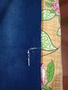 Dark Blue Jeans With Cut On Left Leg..