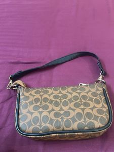 Coach Clutch sling Bag