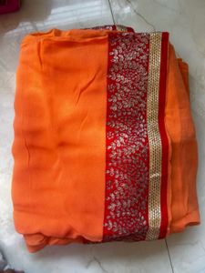 Elegant Orange Saree with stitched blouse