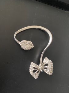 Silver White Stylish Bow Lips Single Ear Cuff