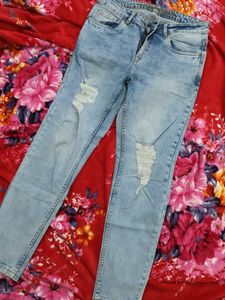 Ripped Light Wash Jeans