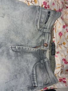 Distressed Gray Denim Jeans