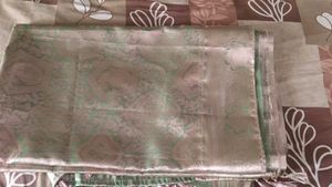 A Beautiful Light Green With Pink Shade Silk Saree