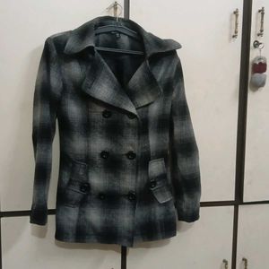 black and grey check mid length coat