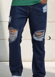 street full length heavy distressed straight jeans