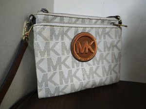 Authentic Mk monogram Sling Bag