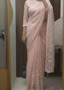 each 700Elegant Pink Embroidered Saree