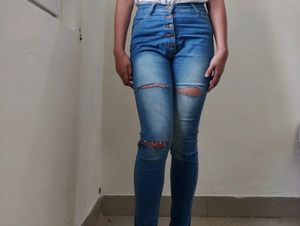 Light Blue Ripped Jeans... Condition--9/10...Size-