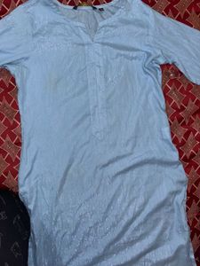 Blue Kurti With Silver Threads On It